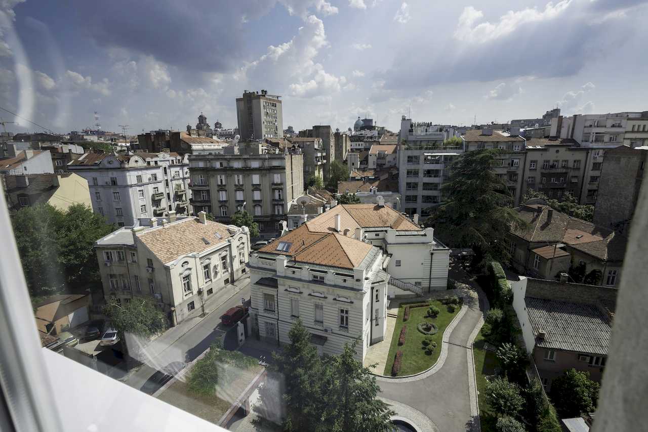 View over central Belgrade rooftops from above – Apartment Urban Zen – City Break Apartments